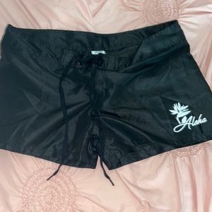 black aloha shorts